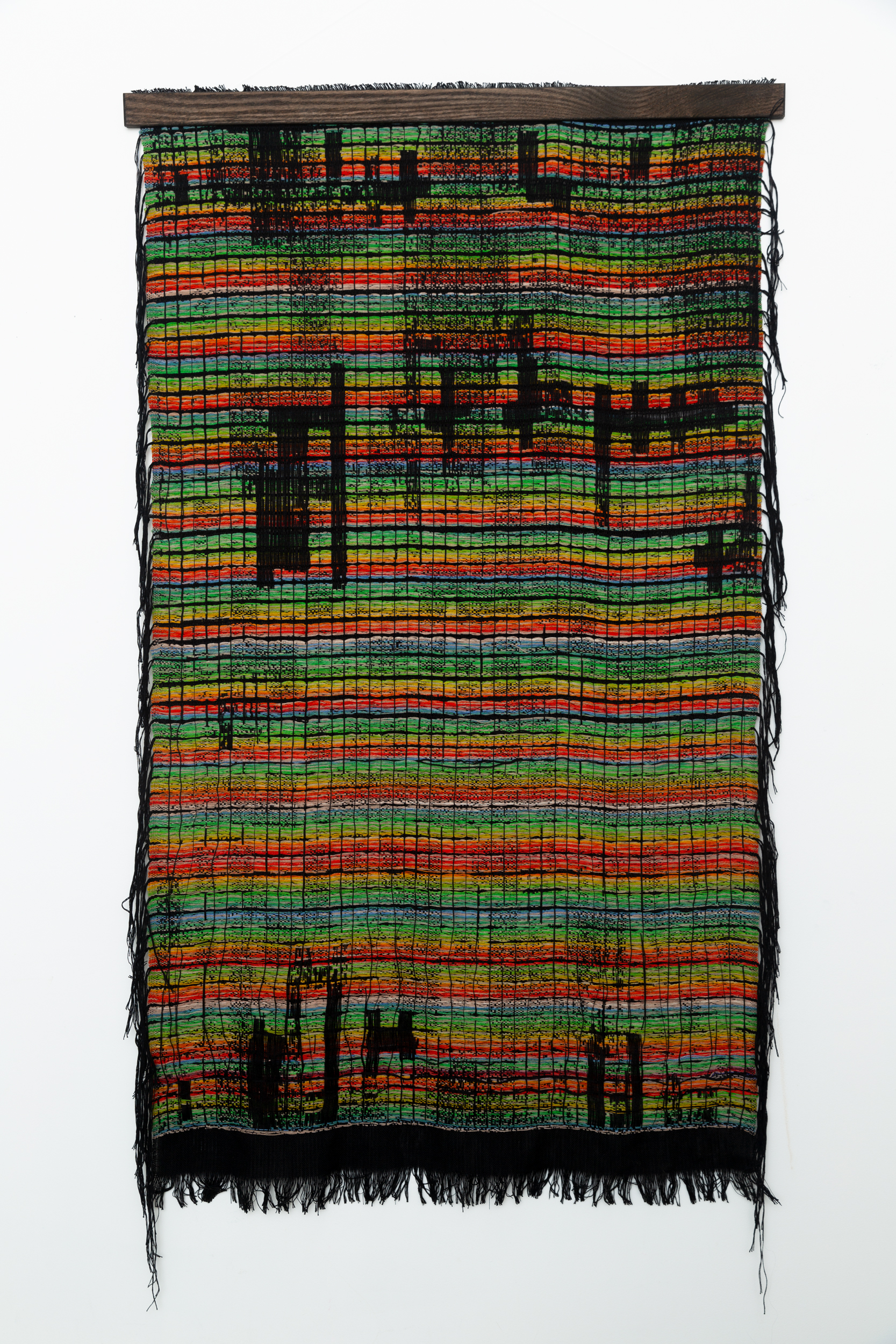 A woven colorful textile.