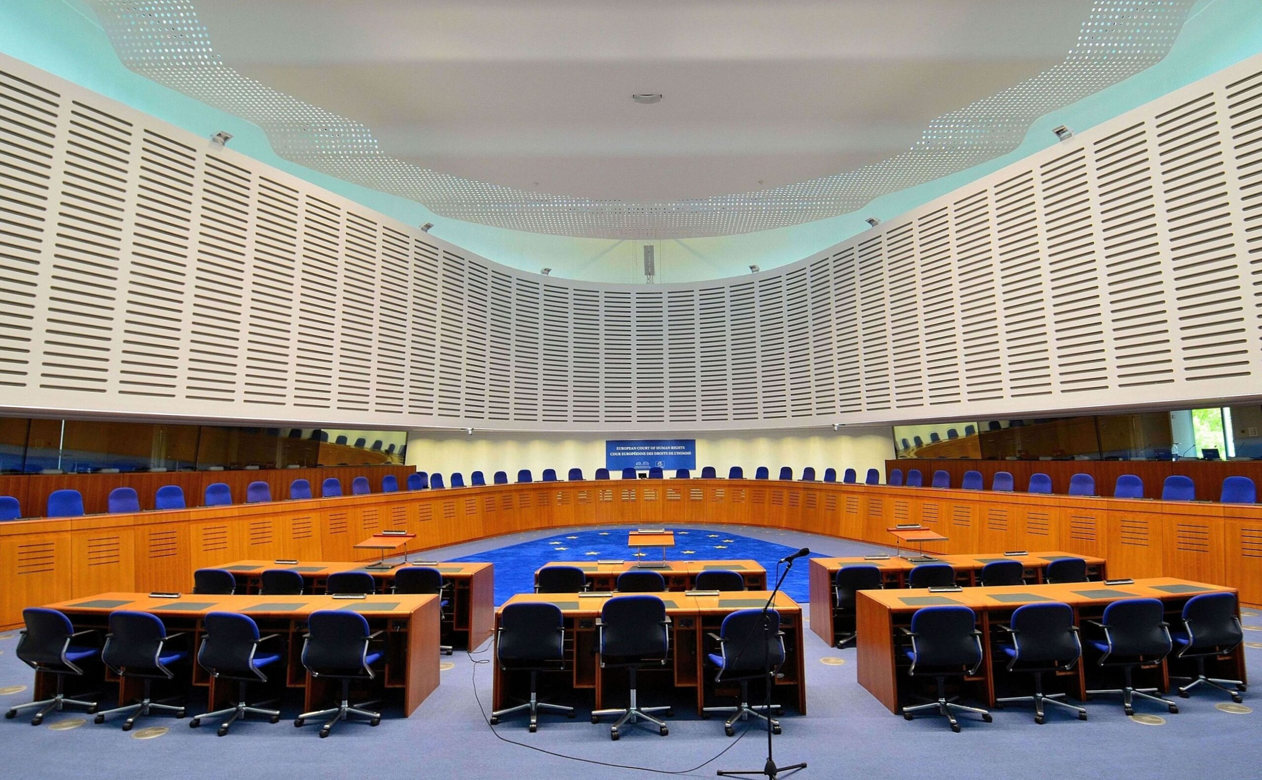 Courtroom of the European Court of Human Rights in Strasbourg. Photo by Adrian Grycuk. Creative Commons Attribution-Share Alike 3.0 Poland license.