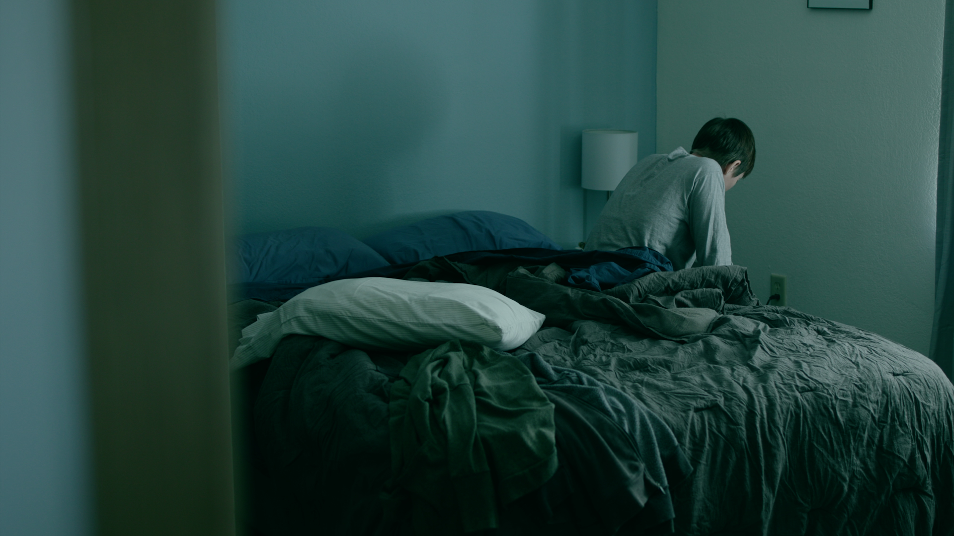 Logline: A young woman's dull routine is disrupted by a pesky housefly she captures in a jar, leading to bizarre occurrences and forcing her to confront the truth of who is actually trapped. This is a screengrab from my short film 