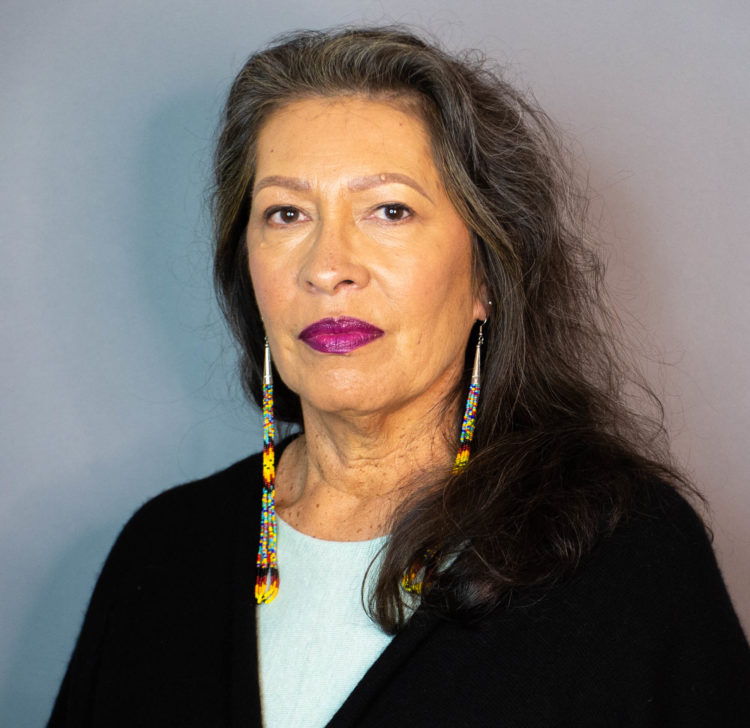 She is an American Indian woman in the 21st Century whose eyes are focused on the path that connects the ancestors to our descendants.