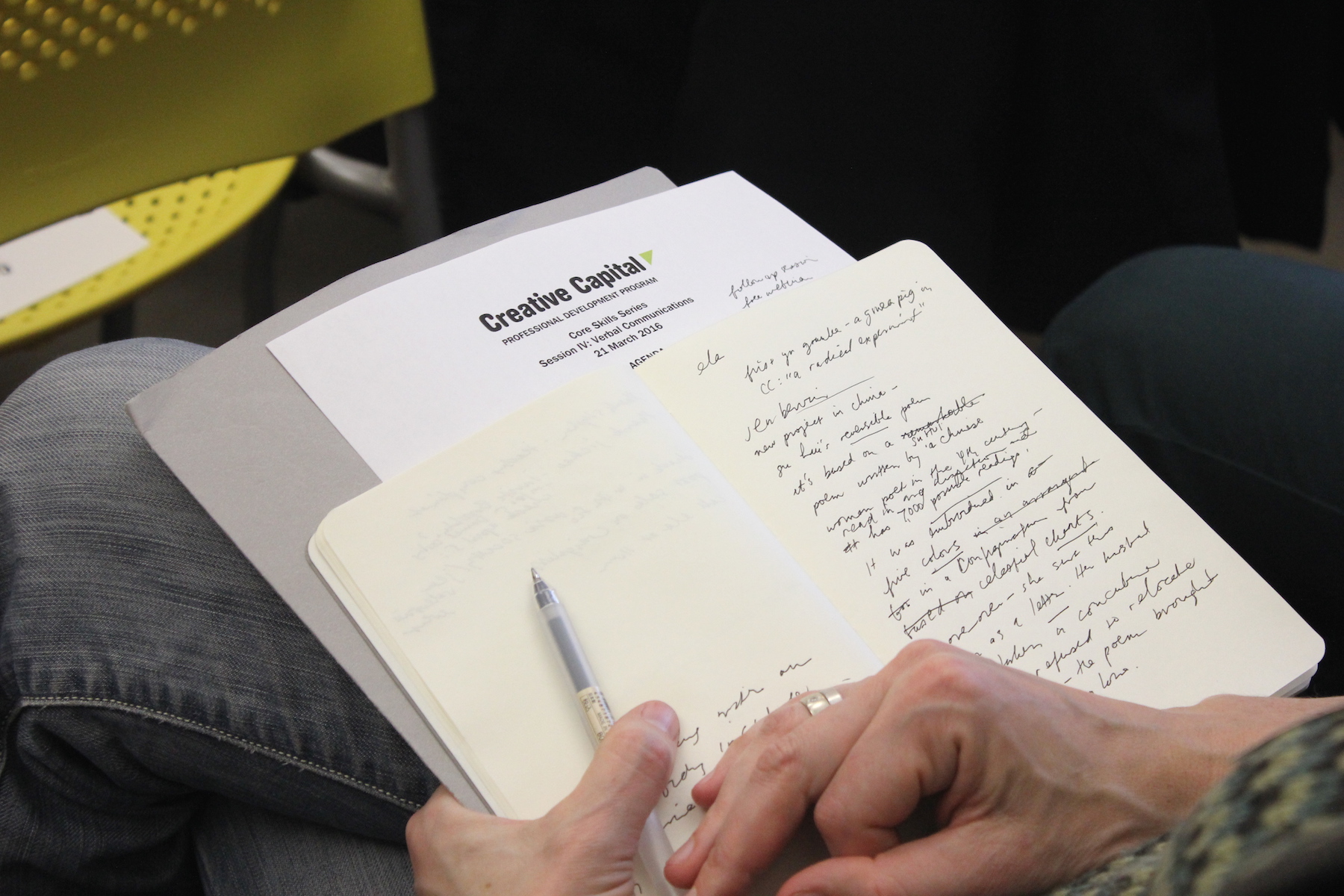 A participant jots down some thoughts at a Creative Capital Professional Development workshop. 