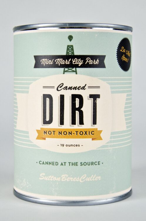 A can with a label that says "Canned Dirt."