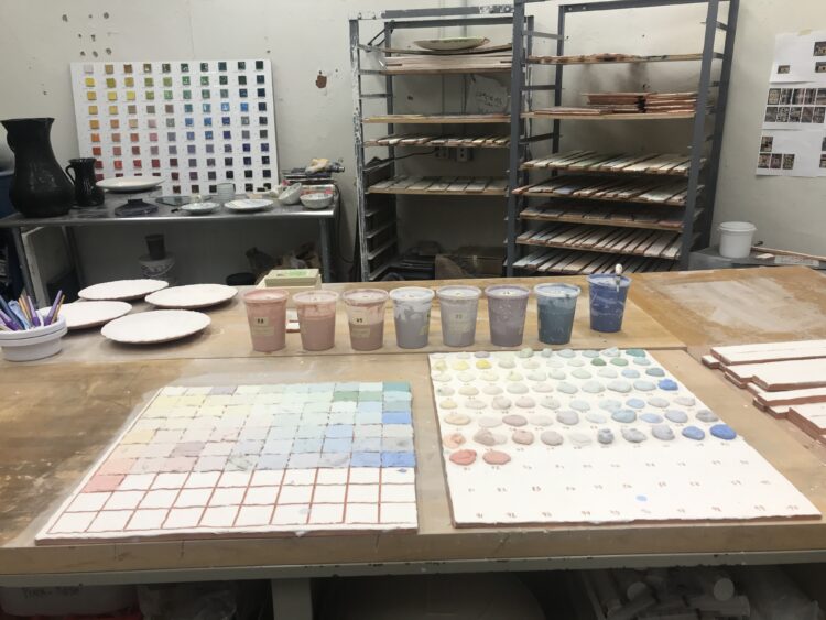 Polly Apfelbaum tests various ceramic glazes at Arcadia University’s ceramics studio.